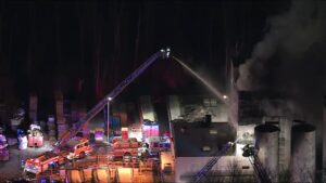 Crews battling multi-alarm fire at business in Burlington Township