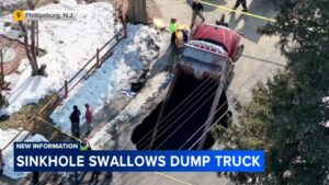 Sinkhole swallows dump truck in Phillipsburg, New Jersey