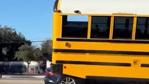Jaguar Driver Crashes Into School Bus on Video, Later Arrested for DV at Home