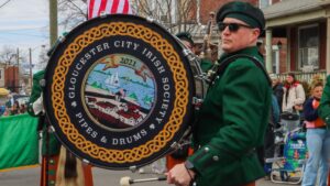 Sounds of bagpipes and drums ring through Gloucester City during annual parade