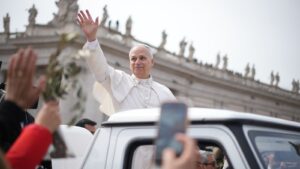 Pope Leo XIV rejects claims that God justifies war in Palm Sunday Mass message in St. Peter’s Square