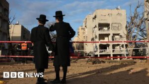 Iranian missiles injure 160 in towns near Israeli nuclear site